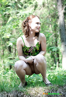 Adorable red-haired shortie takes a leak in forest