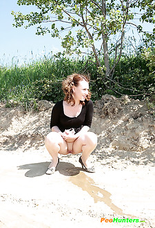 Redhead with round booty pees us all a whole river