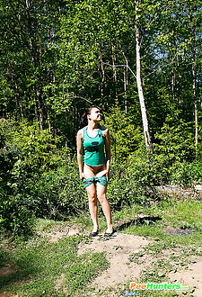 Young girl slides out of her shorts to pee quickly