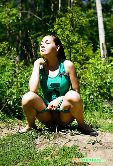 Girlie pees and puts shorts back on without wiping