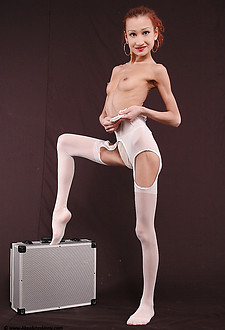 Absolute skinny legs in white pantyhose