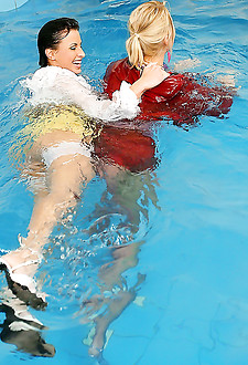 Three wet lesbians playing with each other in the deep end