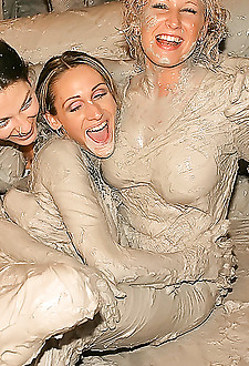 Large group of hot lesbians girls getting covered in mud