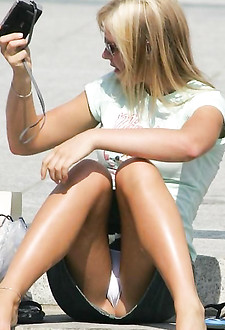 Boozed chicks lose panties and expose nude upskirt