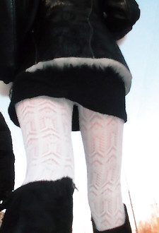 Panty hiding her nub up the skirt