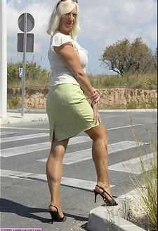 See stockings on long legs of this amazingly hot Big tit mature woman