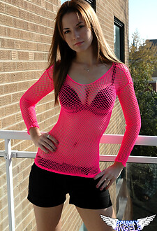 Excited babe Amy Spunky strips down to her pink mesh lingerie at home
