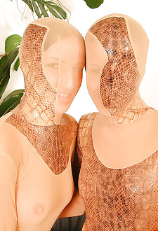 Twin girls in spandex catsuits