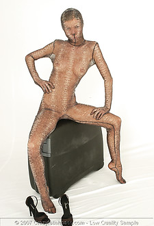 Hot spandex girl in a suitcase