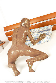 Beautiful girl in full body spandex suit and mask